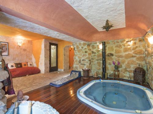 a room with a jacuzzi tub in a house at Villa Villa Oriental by Interhome in Genazzano