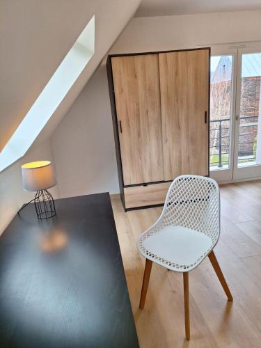 Un lugar para sentarse en Maison individuelle, 10 minutes de Colmar 4 chambres - 8 personnes - 2 sdb