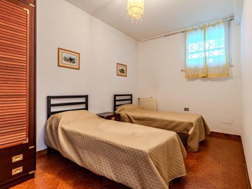 Cama o camas de una habitación en Apartment Attilio lake front view by Interhome