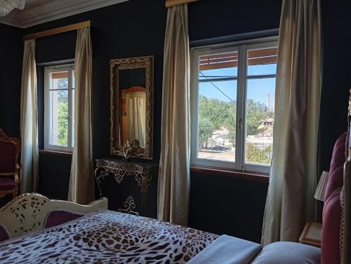 Postel nebo postele na pokoji v ubytování IRIS baroque apartment