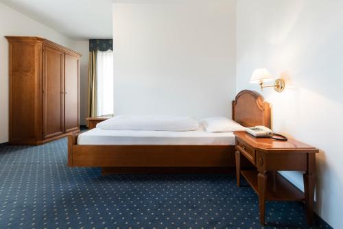 Posteľ alebo postele v izbe v ubytovaní Weingarten Terlan - Rooms & Breakfast