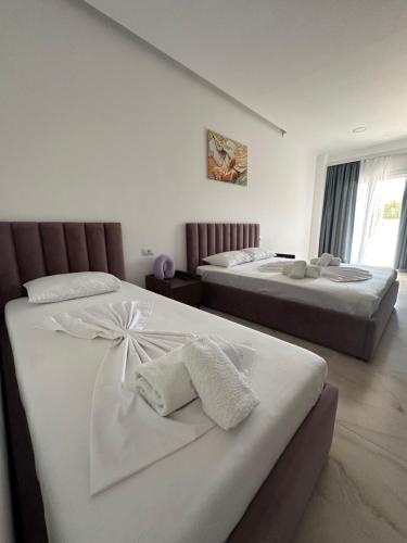Katil atau katil-katil dalam bilik di Liel Apartments
