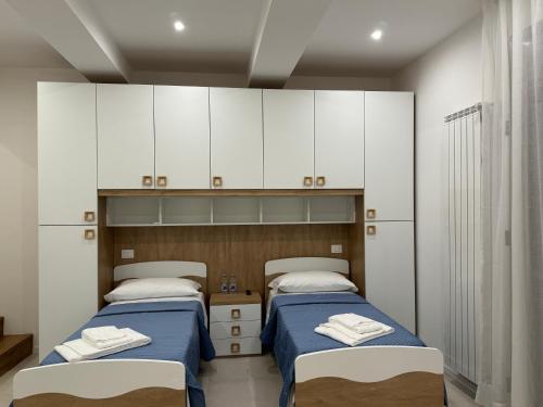 Postel nebo postele na pokoji v ubytování B&B La Coccinella
