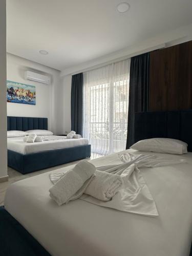 Katil atau katil-katil dalam bilik di Liel Apartments