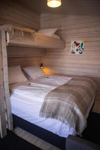 Cama o camas de una habitación en Dalahyttur