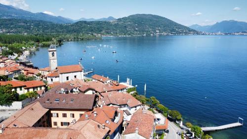 an aerial view of a town on a lake at La Bretonne in Feriolo