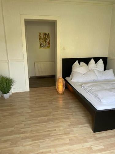 Katil atau katil-katil dalam bilik di Wunderschöne Wohnung in DoKi