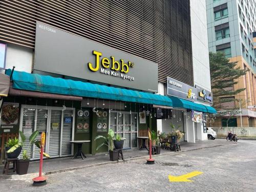 a jelloeyes store on a street in a city at Noah's Studio in Shah Alam