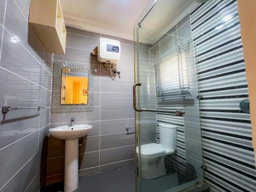 Koupelna v ubytování Box Residence