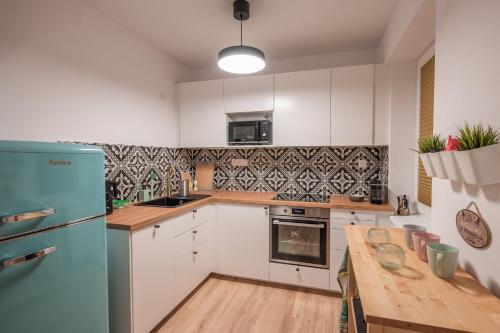 Kuchyň nebo kuchyňský kout v ubytování Apartmán Claudia - Rezidence K Lanovce