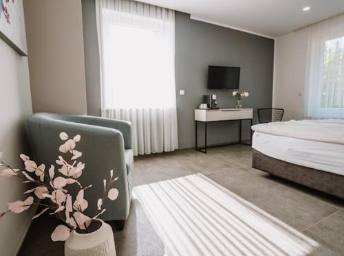 Ένα ή περισσότερα κρεβάτια σε δωμάτιο στο Mey Boardinghouse