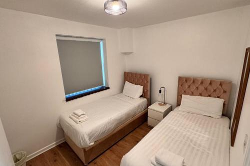 Postel nebo postele na pokoji v ubytování Cosy 2BD Flat in the City Centre - Temple Bar