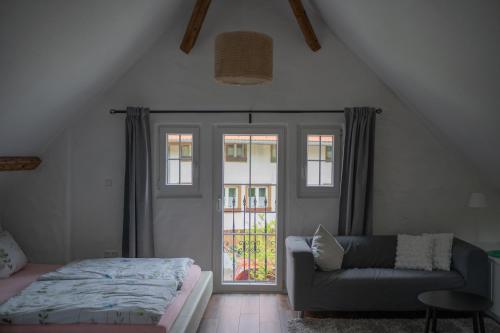 Ένα ή περισσότερα κρεβάτια σε δωμάτιο στο Wallys Hüsli im Schwarzwald