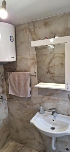 Koupelna v ubytování Apartments Bajceta