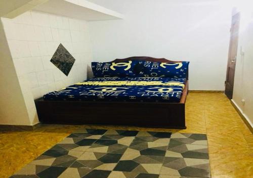 Un pat sau paturi într-o cameră la Auberge chez le P