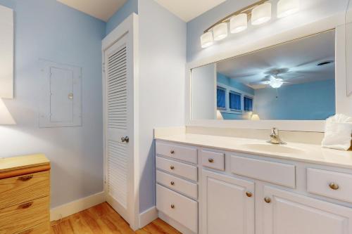 a bathroom with a sink and a mirror at Sea Colony - 3701 Tie Breaker in Bethany Beach