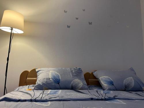 Postel nebo postele na pokoji v ubytování GOLD Apartman