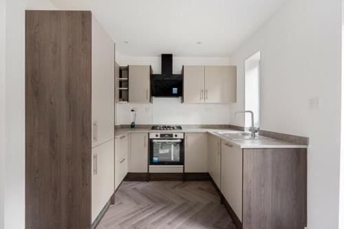 Kuchyň nebo kuchyňský kout v ubytování Rochester Lux Stay Townhouse 2