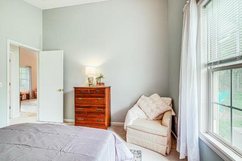 a bedroom with a bed and a dresser and a chair at Roanoke Mountain Home 4 Mi to Blue Ridge Parkway! in Roanoke