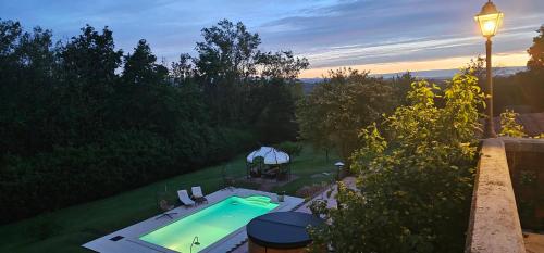 an overhead view of a swimming pool in a backyard at Villa Fonte in Ferrere