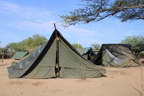 a tent in the middle of the desert at Popo Camp Lake Baringo in Ol Kokwe