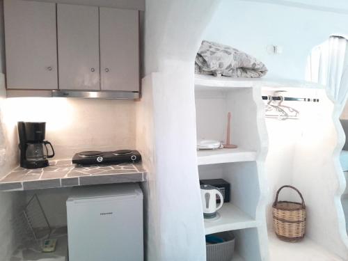 Η κουζίνα ή μικρή κουζίνα στο Sunset Suites 'Annada