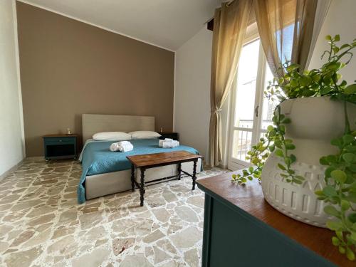 Postel nebo postele na pokoji v ubytování Le Gorgoni b&b