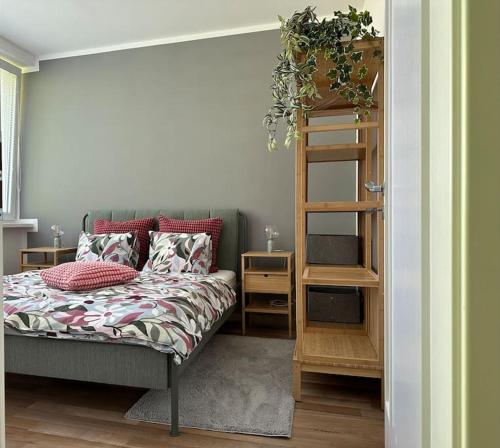 Postel nebo postele na pokoji v ubytování apartmán v Šamoríne