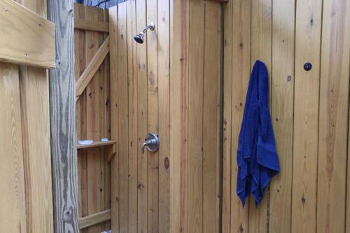 a wooden wall with a blue towel hanging on it at Flyers' Landing in Jacksboro