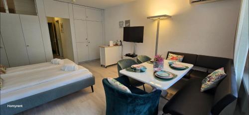 Postel nebo postele na pokoji v ubytování Holiday Suite 304 Residenza Lago di Lugano