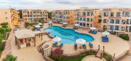 an aerial view of a swimming pool at a resort at Beautiful Apartment in Egyptian Experience Resort in Sharm El Sheikh