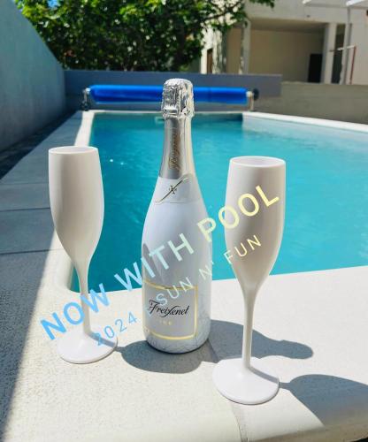 Sun n' Fun Apartments with Pool