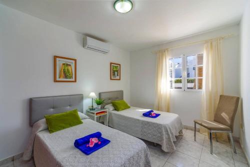 Postel nebo postele na pokoji v ubytování Villa Sol Lanzarote by Villa Plus