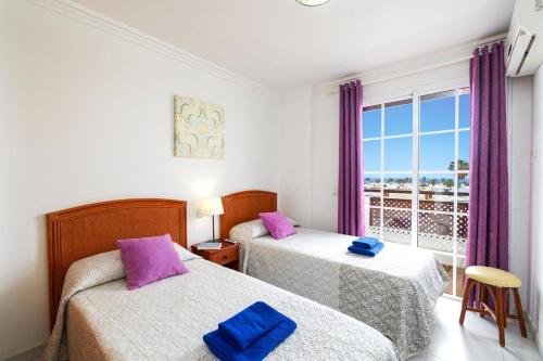 Posteľ alebo postele v izbe v ubytovaní Villa Arco Iris by Villa Plus