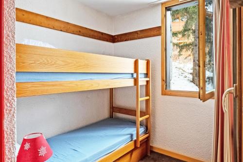 Poschodová posteľ alebo postele v izbe v ubytovaní Résidence Plagne Lauze - maeva Home - Studio 4 personnes - Confort 594