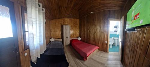 Ένα ή περισσότερα κρεβάτια σε δωμάτιο στο Casa Roko