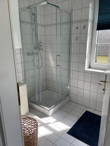 a shower with a glass door in a bathroom at Apartment in Velden am Wörthersee, Top 4 in Velden am Wörthersee