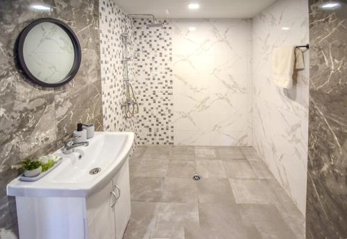 Koupelna v ubytování Стаи за гости Ингилизовата къща