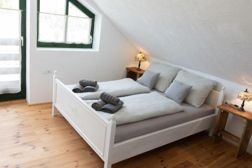 Postel nebo postele na pokoji v ubytování Vályog Vendégház