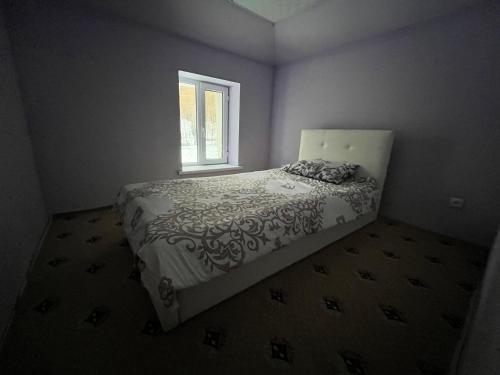 Ένα ή περισσότερα κρεβάτια σε δωμάτιο στο Bagu HOMESTAY