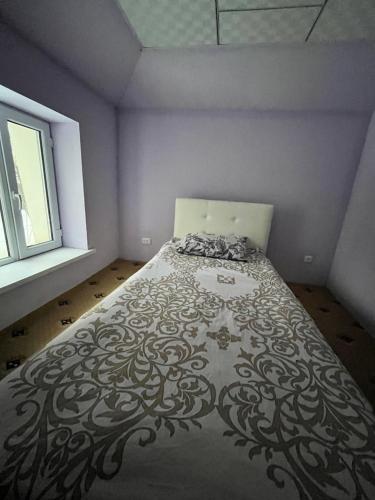 מיטה או מיטות בחדר ב-Bagu HOMESTAY
