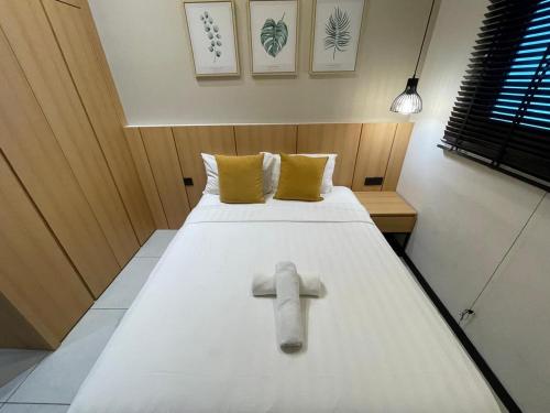 เตียงในห้องที่ Opus Residence Kuala Lumpur By Great Service