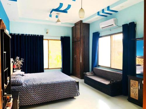 מיטה או מיטות בחדר ב-Sunrise Family Stay Gulshan Nipa