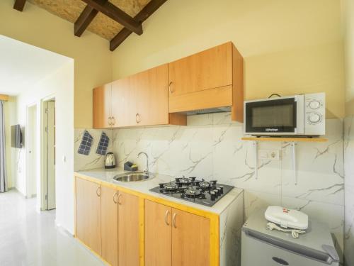 Η κουζίνα ή μικρή κουζίνα στο Residencial LiviaMilena Santa Maria