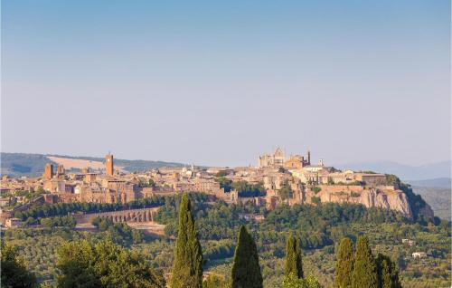 a view of a town on top of a hill at Gorgeous Home In Farnese in Farnese