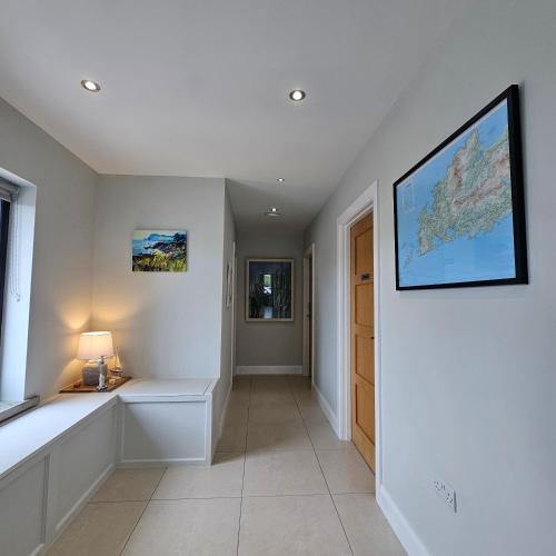 a hallway with a large map on the wall at The Cé Hideout in Tralee