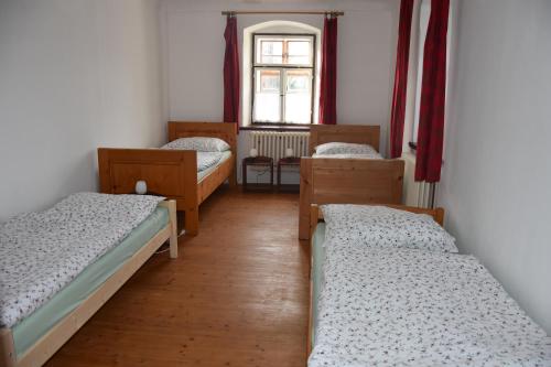 Katil atau katil-katil dalam bilik di Chalupa u Soňi