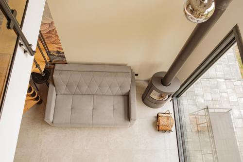 an overhead view of a living room with a couch at Ossona Rest in Częstochowa