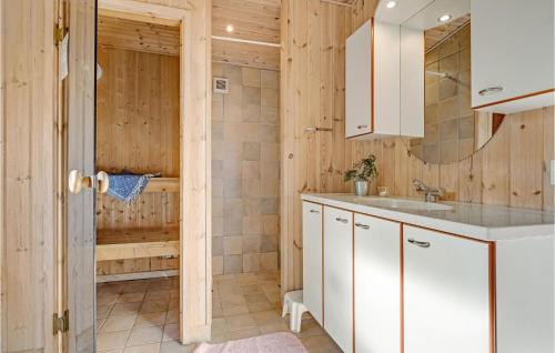 a bathroom with a shower and a sink at Pet Friendly Home In Knebel With Kitchen in Knebel