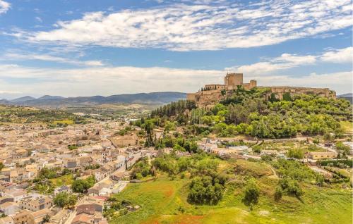 a city with a castle on top of a hill at Awesome Home In Alcala La Real in Alcalá la Real
